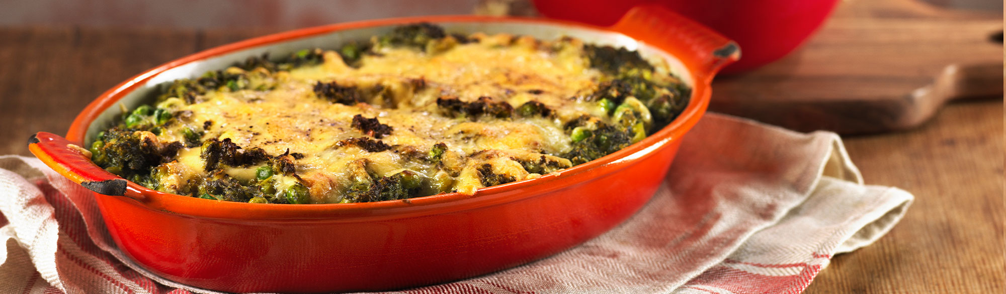 Fiskgratäng med grönkål och ärter