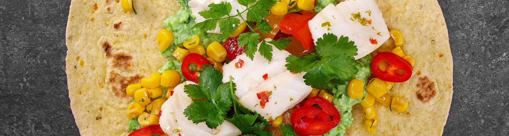 Fisktacos med ärtguacamole och grillad paprika