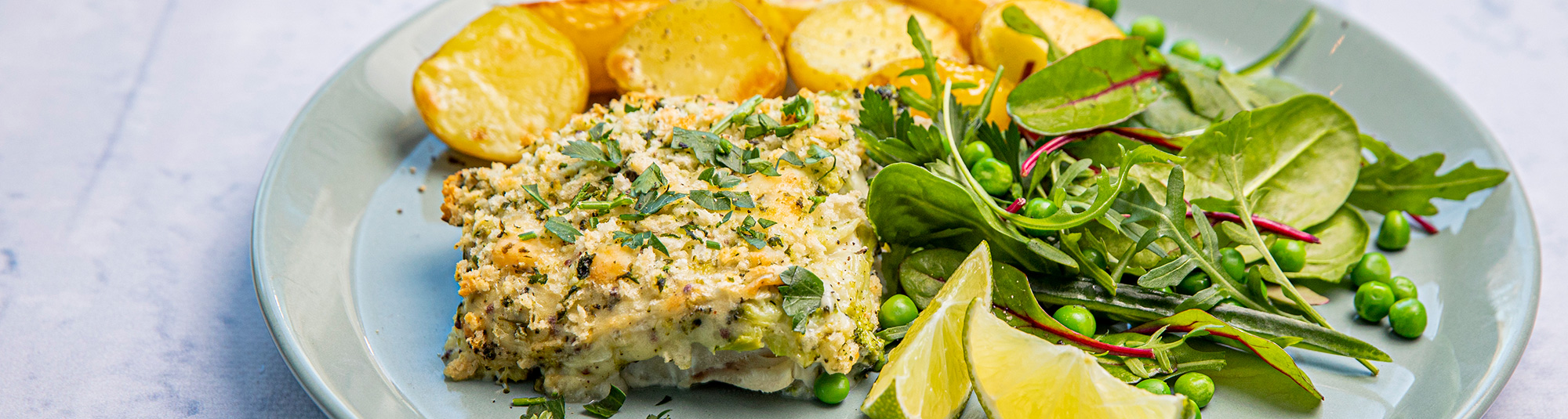 Fisk i ugn med rostad potatis och tomatsås